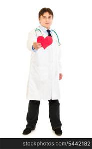 Smiling medical doctor holding paper heart in hand isolated on white&#xA;