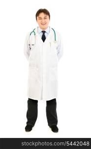 Smiling medical doctor in uniform with stethoscope isolated on white&#xA;