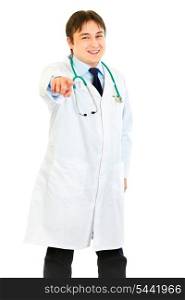 Smiling medical doctor pointing finger at you isolated on white&#xA;