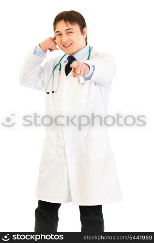 Smiling medical doctor showing contact me gesture isolated on white&#xA;