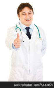 Smiling medical doctor showing thumbs up gesture isolated on white&#xA;