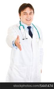 Smiling medical doctor stretches out hand for handshake isolated on white&#xA;