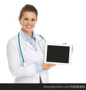 Smiling medical doctor woman showing tablet PC with blank screen