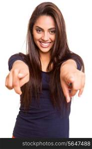 Smiling mix race woman pointing finger forward over white background