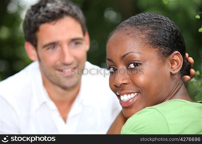Smiling mixed race couple