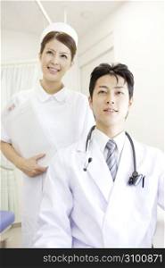 Smiling nurse and doctor