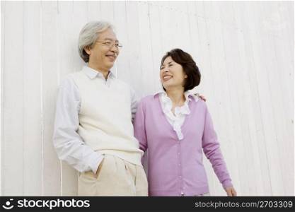 Smiling old asian couple