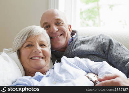 Smiling older couple relaxing together