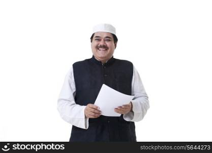 Smiling politician holding a document