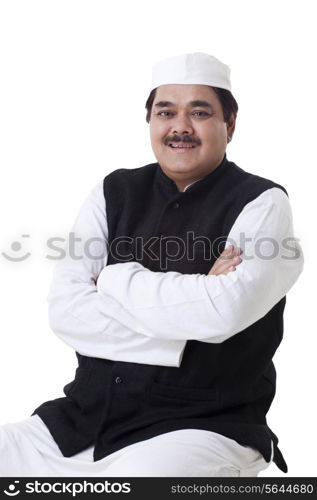 Smiling politician sitting over white background