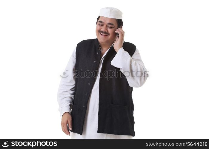 Smiling politician talking on cell phone