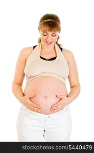 Smiling pregnant holding her tummy isolated on white background&#xA;
