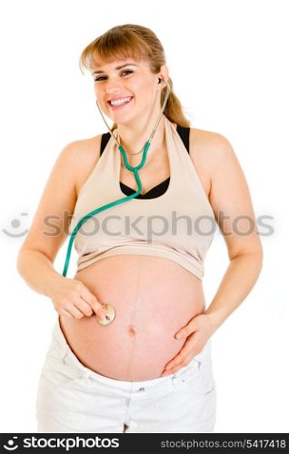 Smiling pregnant woman holding stethoscope on her belly isolated on white&#xA;