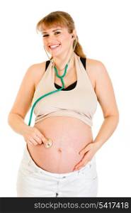 Smiling pregnant woman holding stethoscope on her belly isolated on white&#xA;