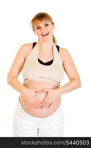 Smiling pregnant woman making heart with her hands on belly isolated on white&#xA;