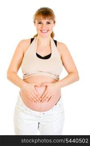 Smiling pregnant woman making heart with her hands on tummy isolated on white&#xA;