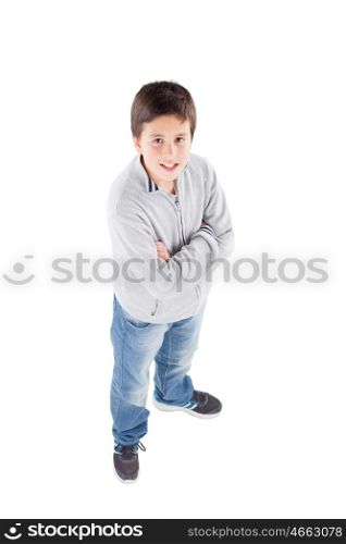 Smiling preteen boy seen from above standing isolated on a white background
