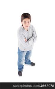 Smiling preteen boy seen from above standing isolated on a white background