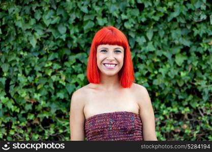 Smiling red head girl during a day in the park