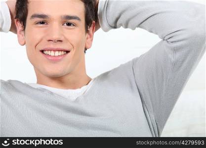 Smiling relaxed young man