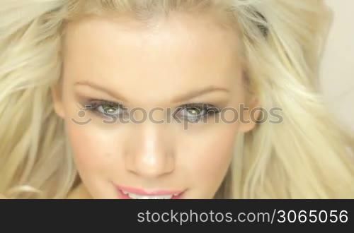 Smiling Seductive Blonde Woman