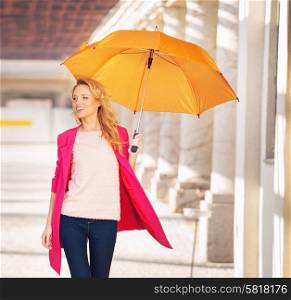 Smiling smart lady with the umbrella