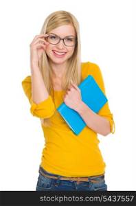 Smiling student girl in glasses with book