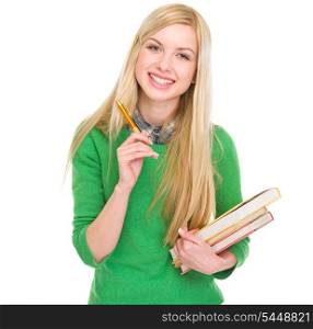 Smiling student girl with books and pen