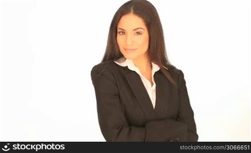 Smiling stylish professional businesswoman with long brunette hair on a white studio background