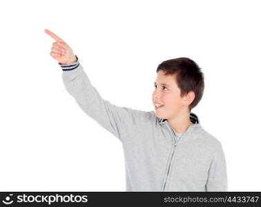 Smiling teenage boy of thirteen indicating something isolated on white background