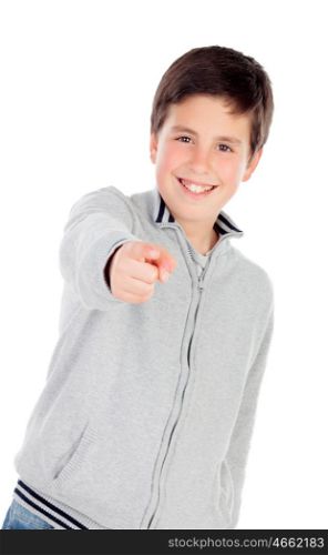 Smiling teenage boy of thirteen indicating something isolated on white background
