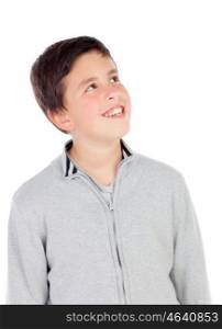 Smiling teenage boy of thirteen looking up isolated on white background