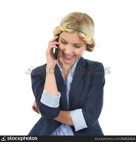 Smiling teenage girl talking mobile phone