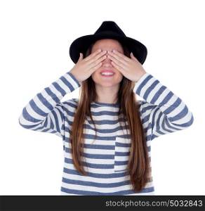 Smiling teenager girl with black hat covering her eyes isolated on a white background