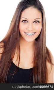 Smiling teenager girl with brackets isolated on a white background