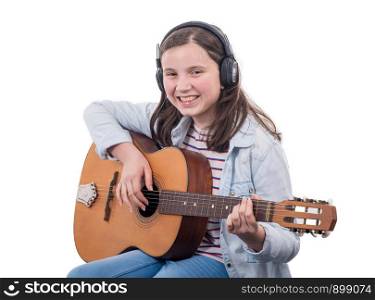 smiling teenager playing guitar isolated on the white background