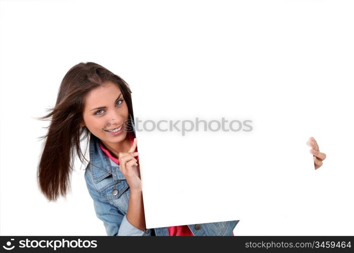 Smiling teenager showing whiteboard