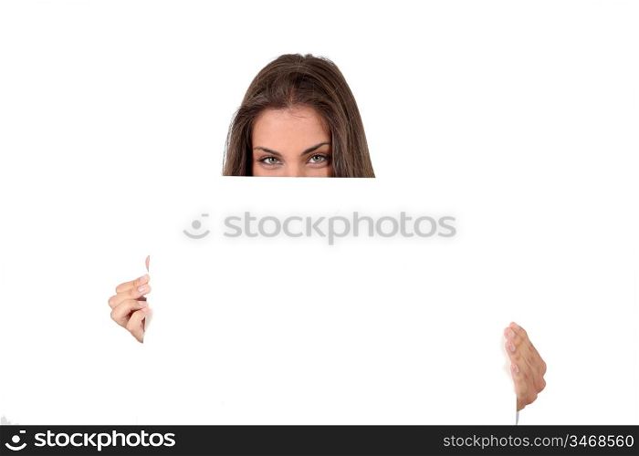 Smiling teenager showing whiteboard
