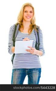 Smiling teengirl with schoolbag writing in notebook isolated on white &#xA;