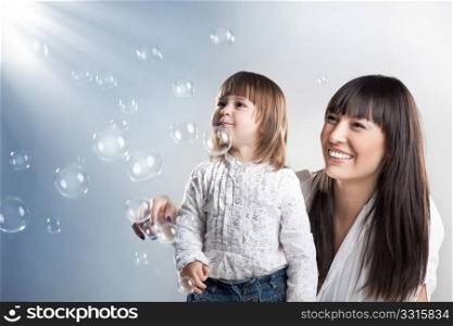 Smiling woman and her daughter