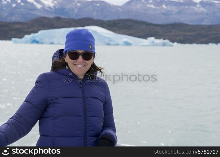 Smiling woman at Lake Argentino, Santa Cruz Province, Patagonia, Argentina