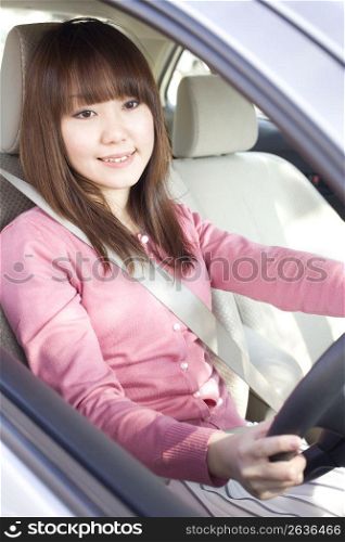 smiling woman driving