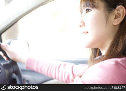 smiling woman driving