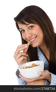 Smiling woman eat healthy whole wheat cereal for breakfast in pajamas on white background