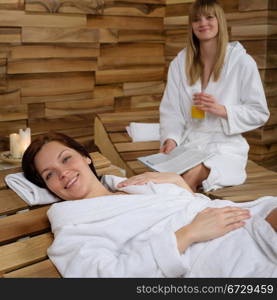 Smiling woman enjoying herself relax at spa center wellness treatment