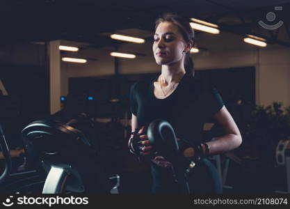 smiling woman exercising gym