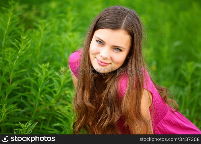 Smiling woman in a field
