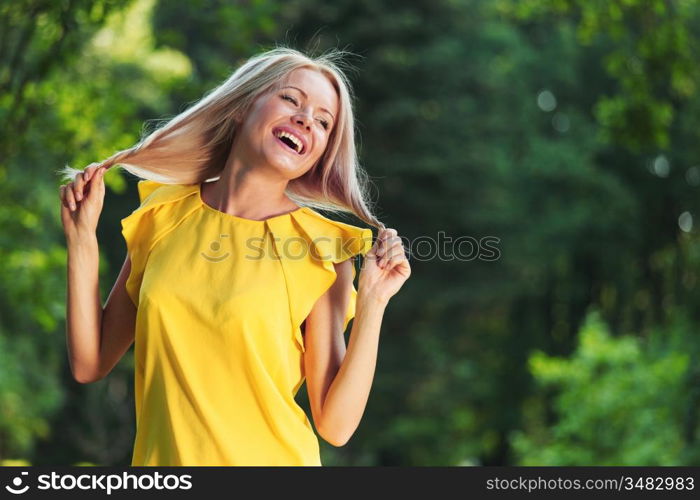 Smiling woman in a park