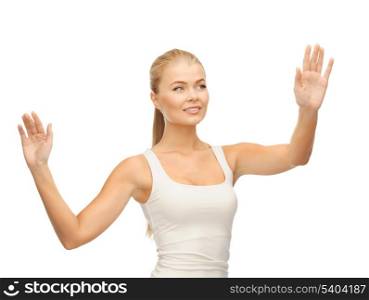 smiling woman in blank white t-shirt with raised hands