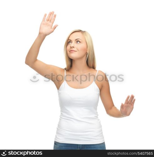 smiling woman in blank white t-shirt with raised hands